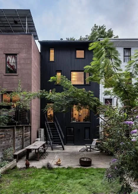 Passive rowhouse retrofitted with fiberglass windows