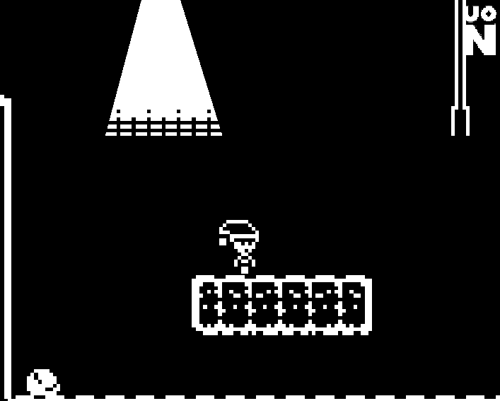 A pixelated black and white video game scene depicting a character jumping over spikes with a barrier of blocks and a faint background featuring a large tent or mountain and a vertical score or timer on the right side.