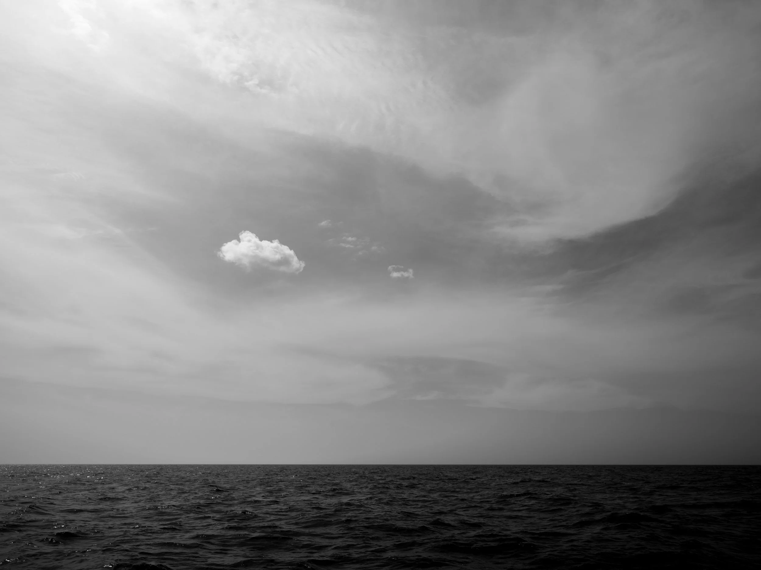 Overcast sky with dark clouds over the ocean