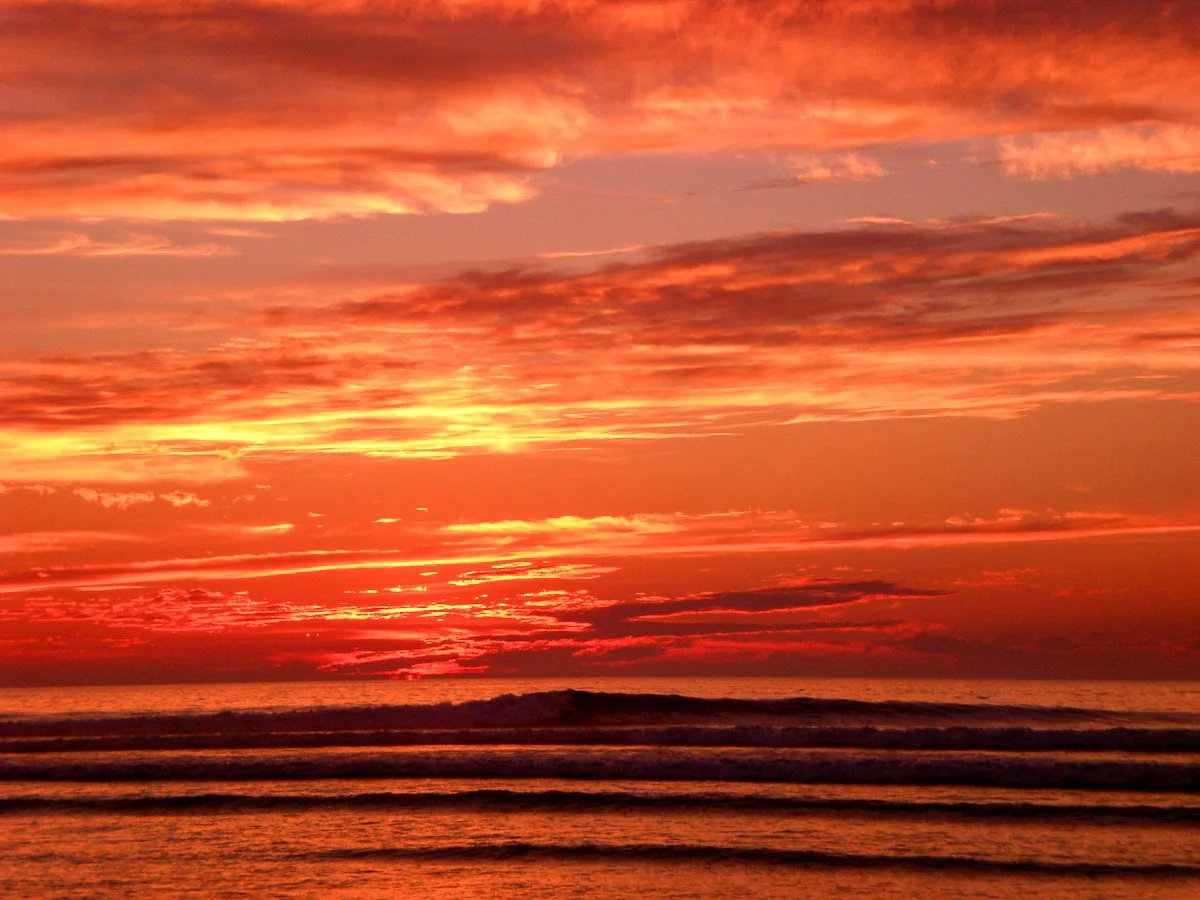 Vivid orange sunset over the Pacific at La Saladita
