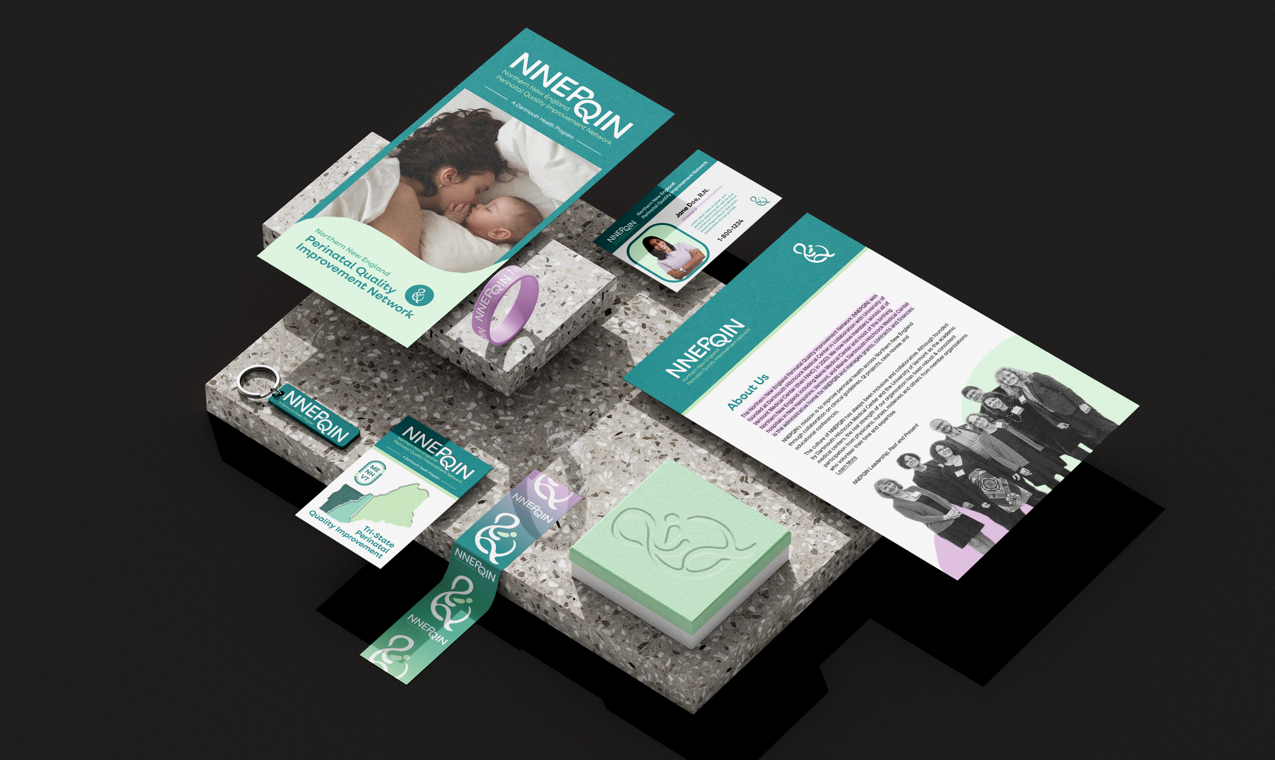 On a black background, various promotional materials for the NNEPQIN organization are displayed, including a brochure with a photo of a woman and baby, a business card, bracelet, a keychain, and paper with informational text and a group photo.