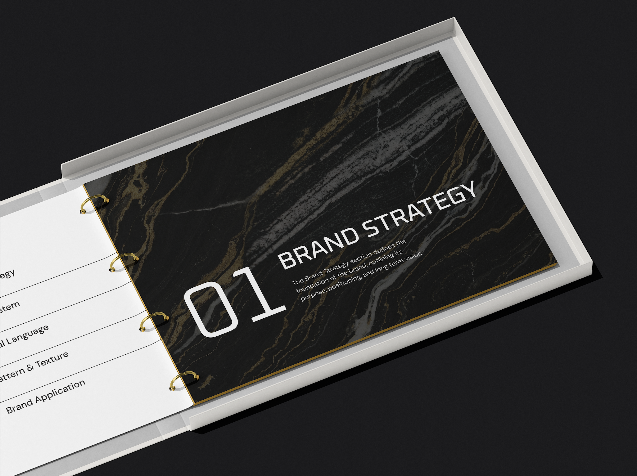 A mockup of a designer binder with a black marble texture cover that says 'Brand Strategy' and has pages inside visible, laying on a black background.