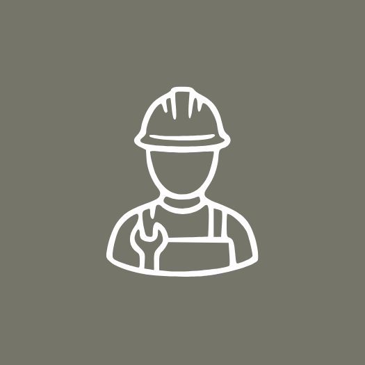 Icon of a construction worker wearing a helmet, holding a wrench.