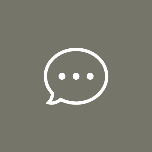 Gray background with white chat bubble icon containing three dots.