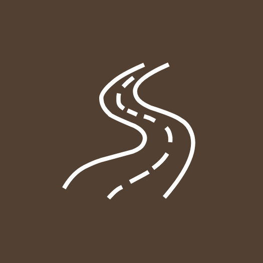 Illustration of a winding mountain road on a brown background.