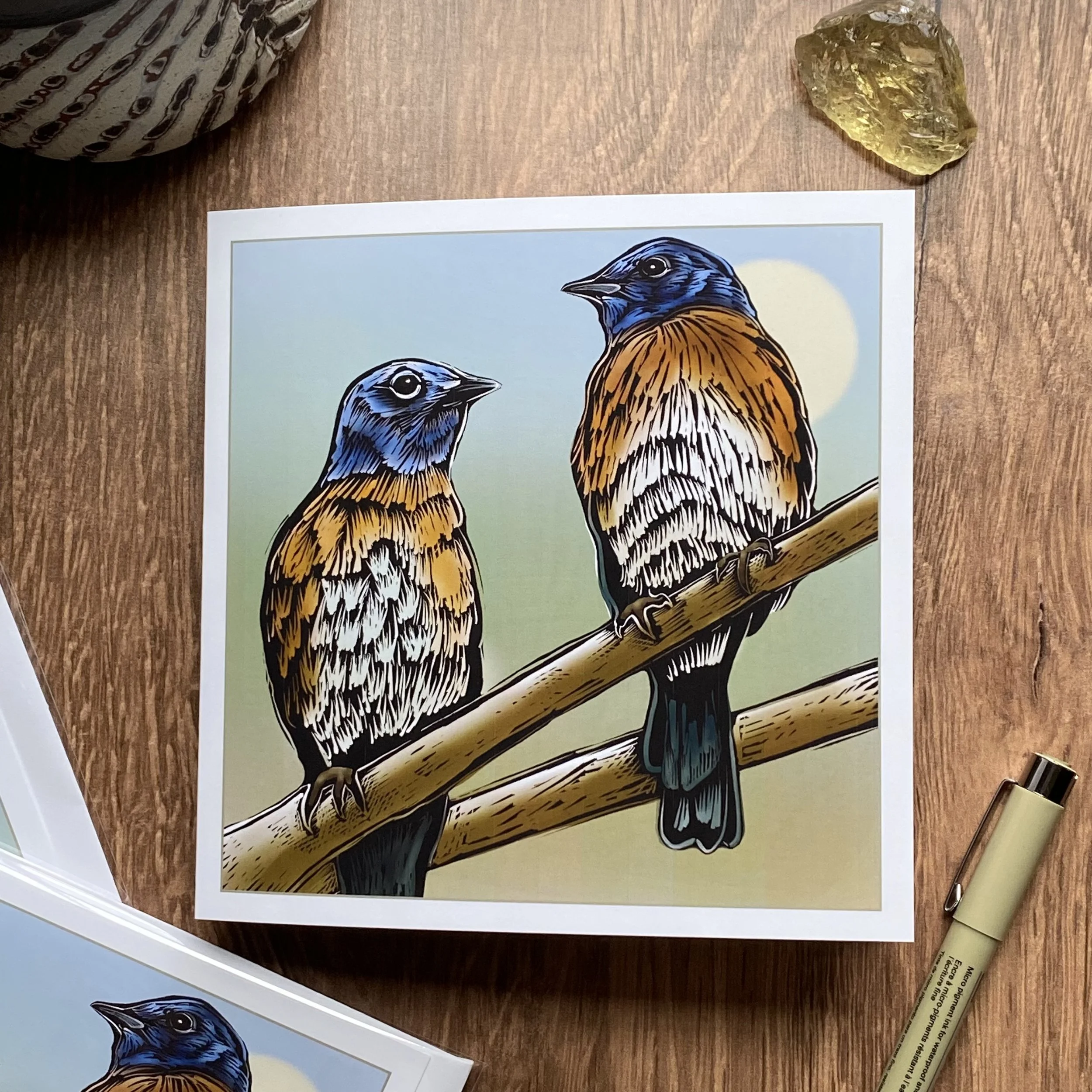 Illustration of two blue and brown birds perched on a branch.