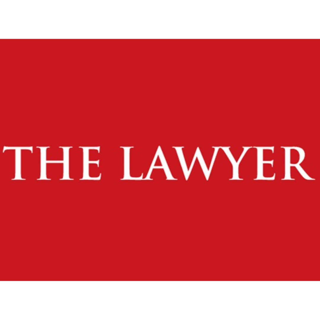 Red background with white text reading "The Lawyer".