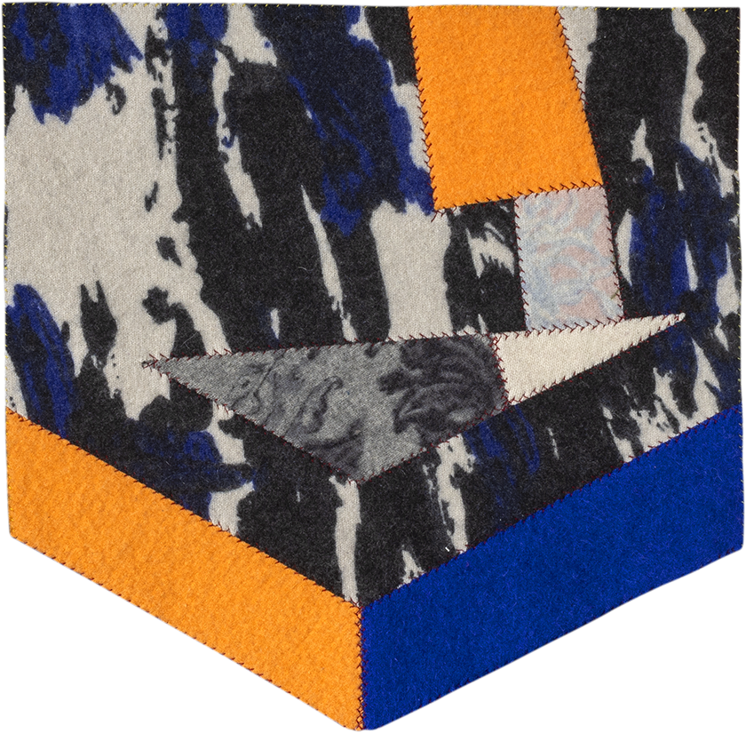 image of geometric textile artwork with multiple colors and patterns including tones of gold, blue, and black