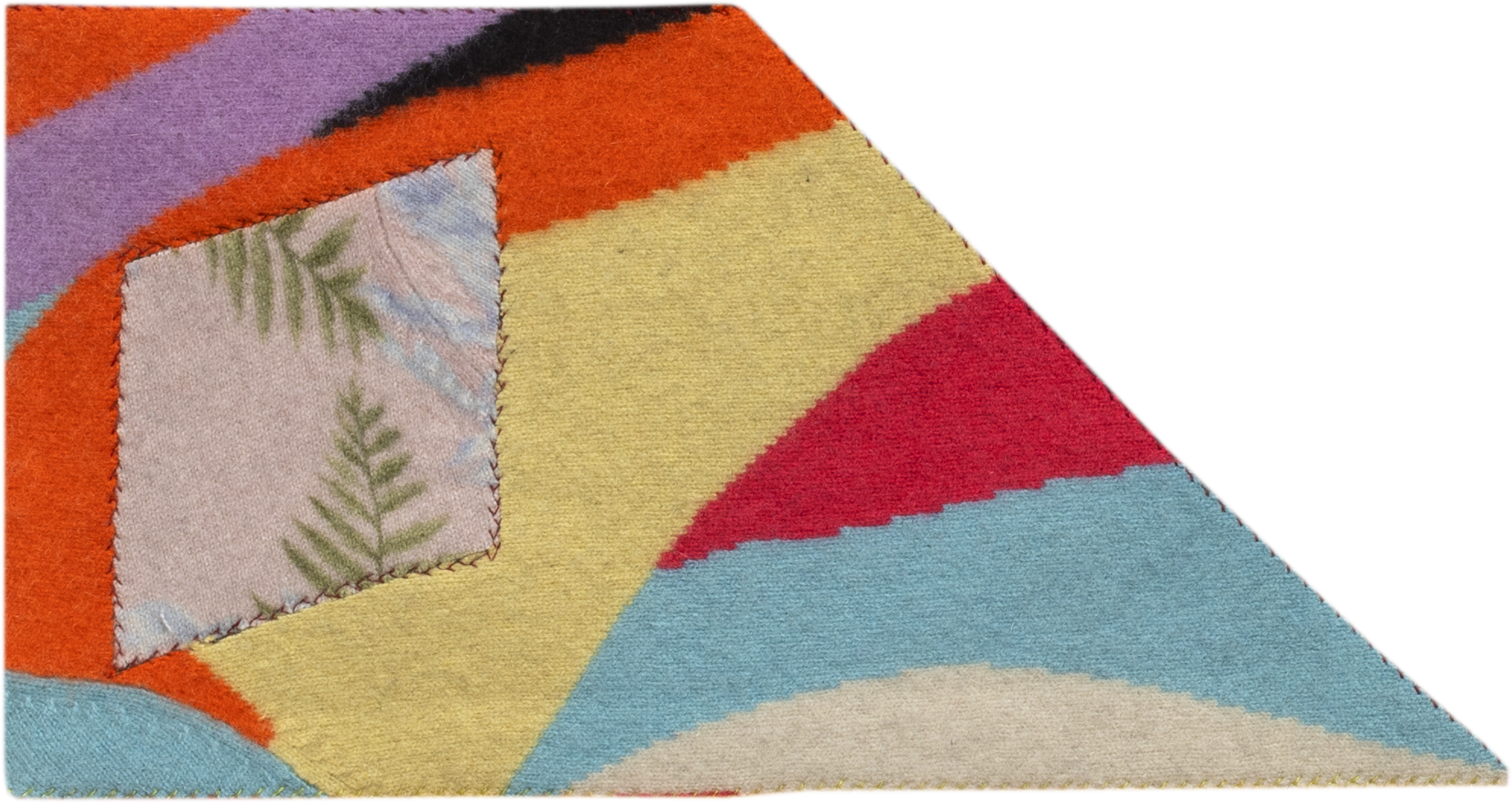 image of geometric textile artwork with multiple colors and patterns including tones of yellow, orange, red, blue, and black