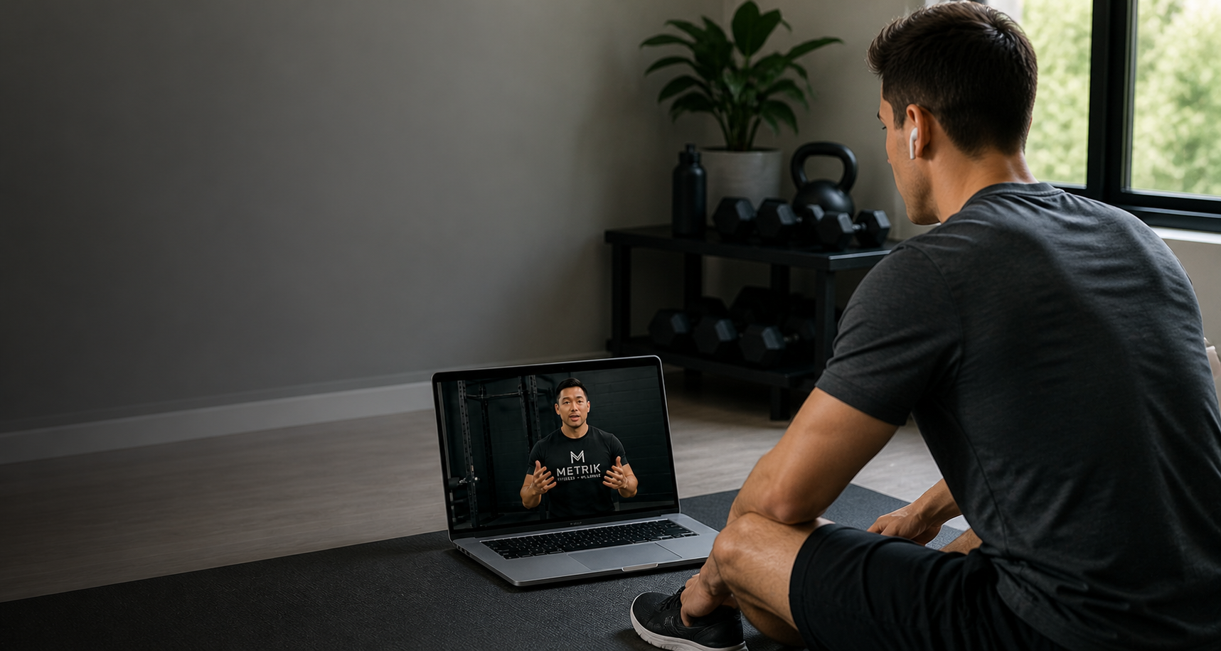 Metrik coach discussing training program with client virtually.