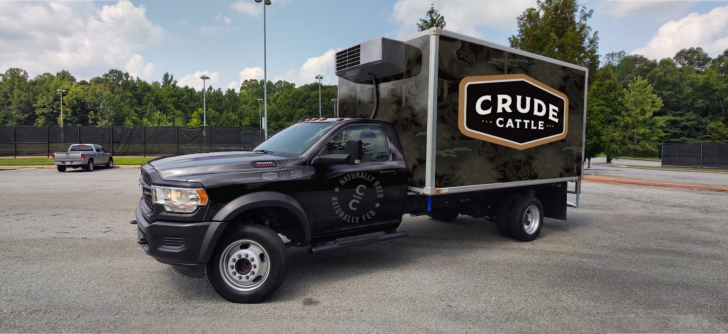 Custom vehicle wrap and decal application on regrigerated delivery truck for Crude Cattle in Orlando.