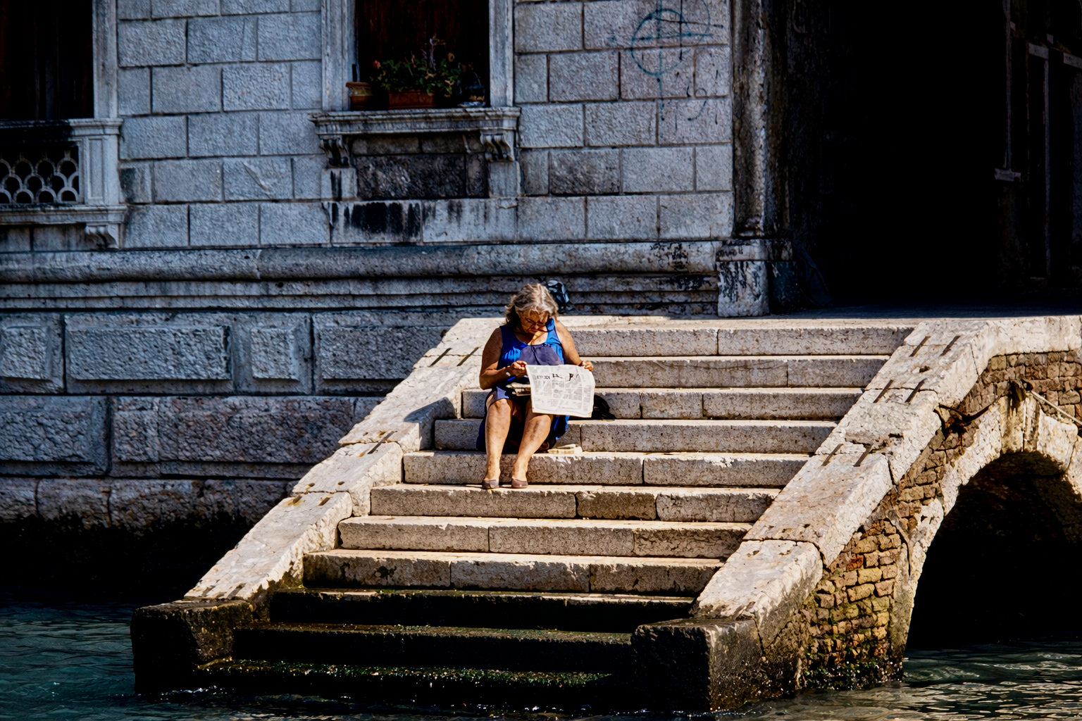 Reading the Paper in Venice