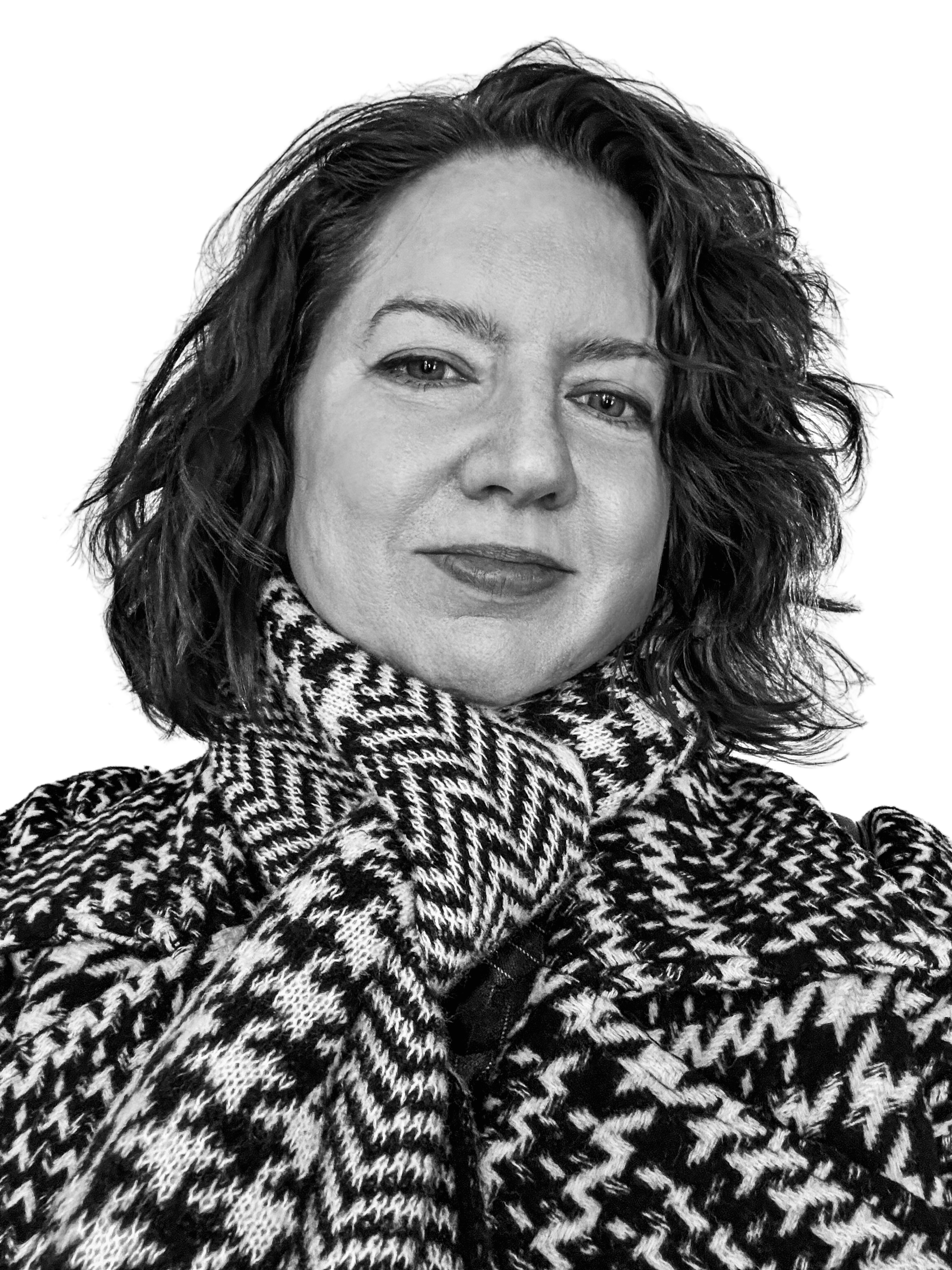 A black and white close-up portrait of Stacey Bramhall