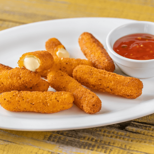 Fried cheese sticks with dipping ranch sauce on a white plate.