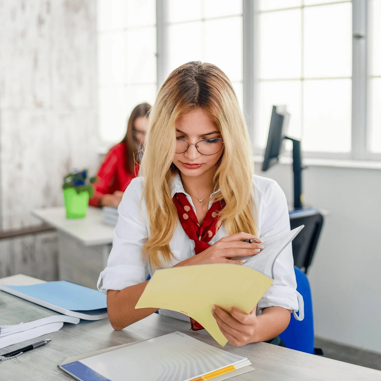 HR professional screening and reviewing a candidate's resume