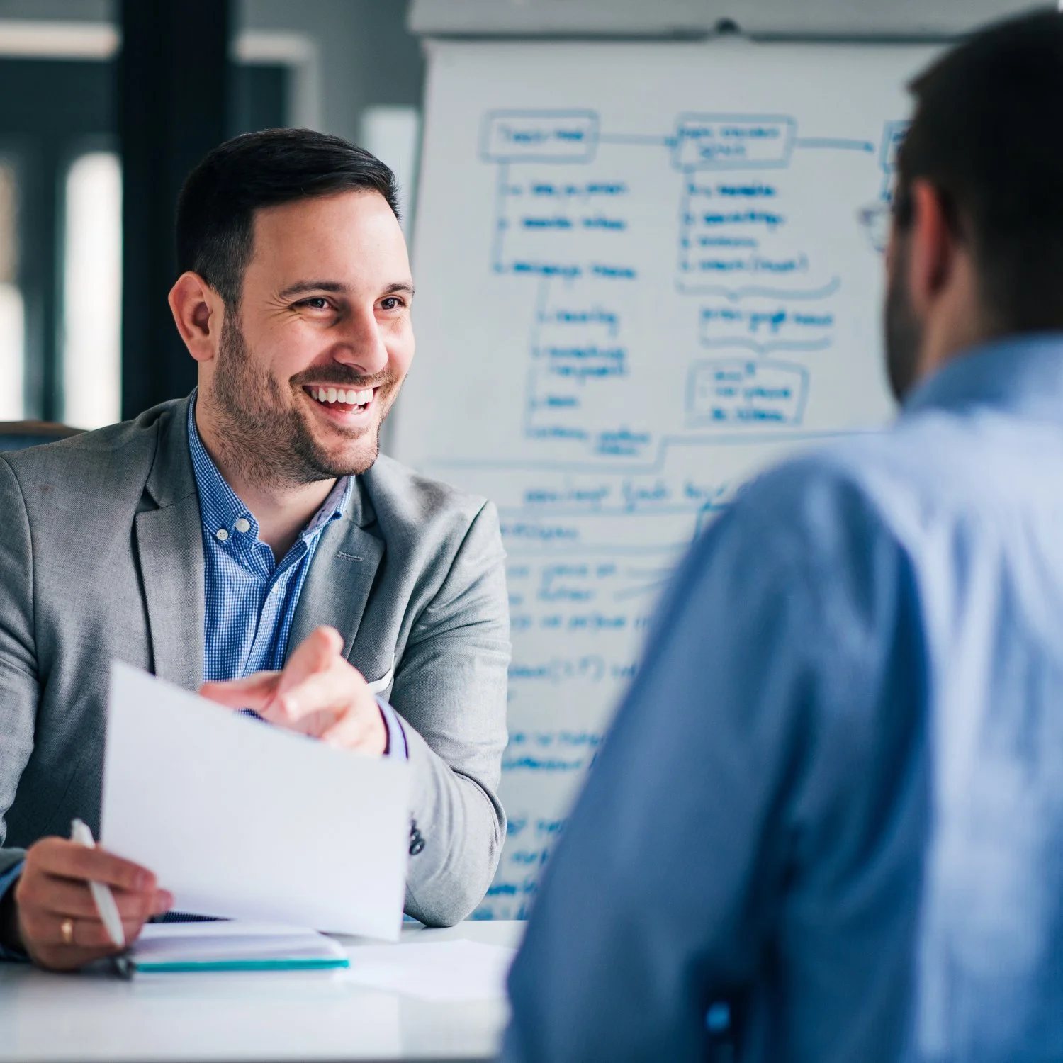 SBH Hires recruiter in a friendly consultation with a client