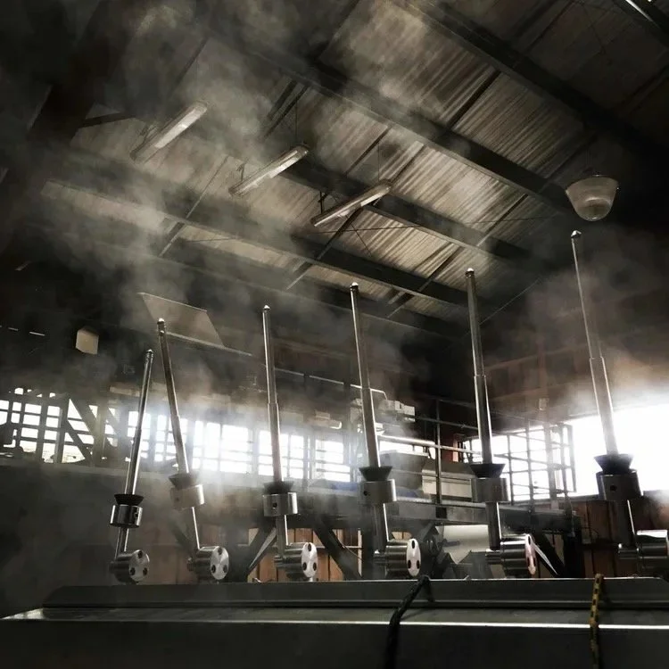 Indoor scene with steam or smoke, shiny metal structure, and wooden beams/roof, possibly part of a factory or industrial facility.