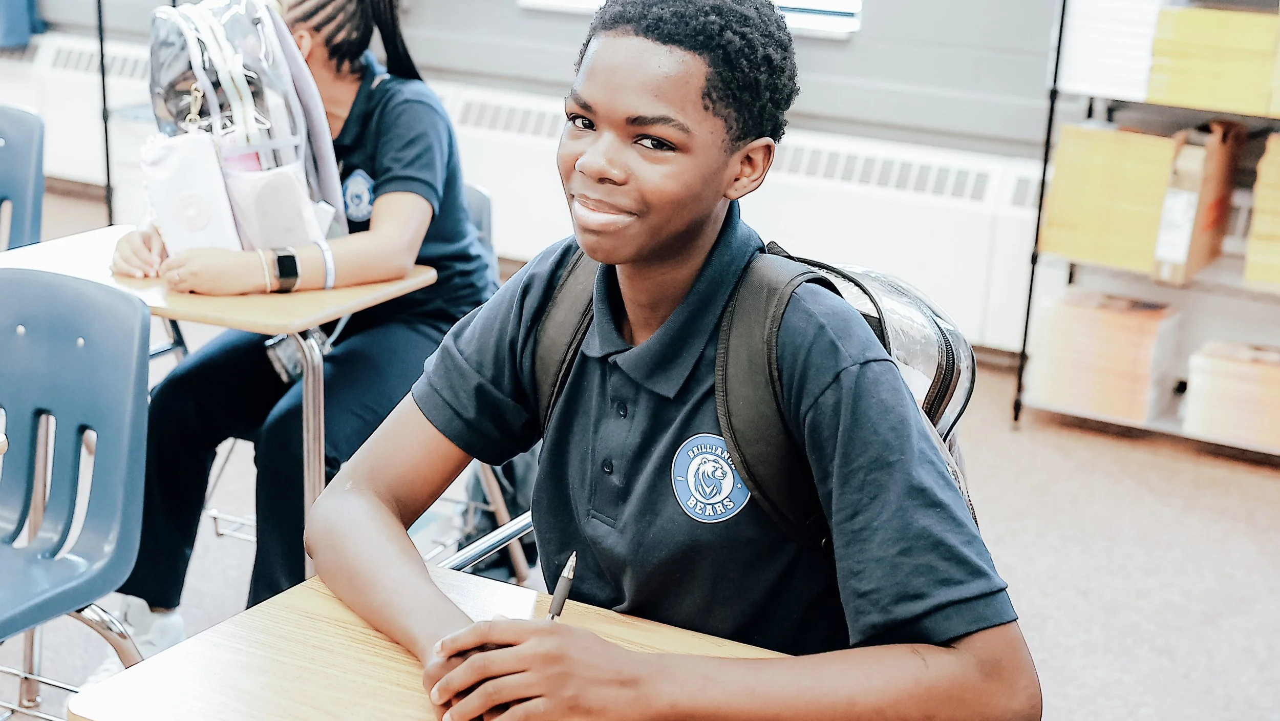 brilliance-boy-student-smiling.jpg