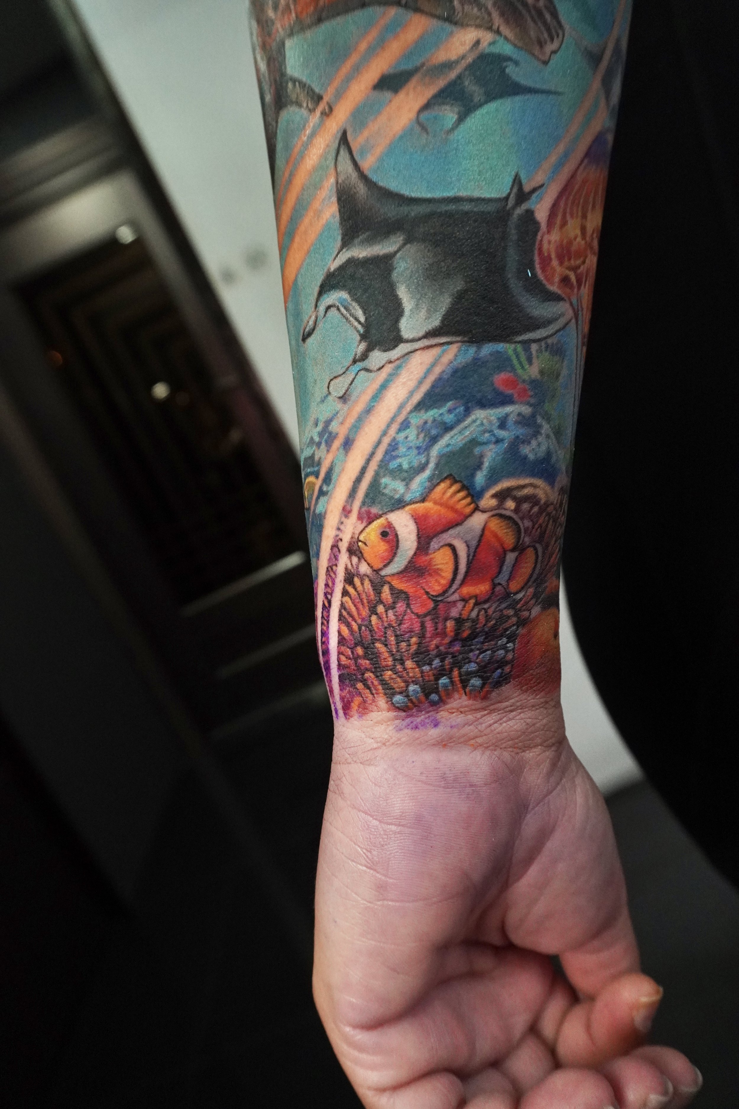 manta ray tattoo clown fish tattoo ocean tattoo reef tattoo Trinidad