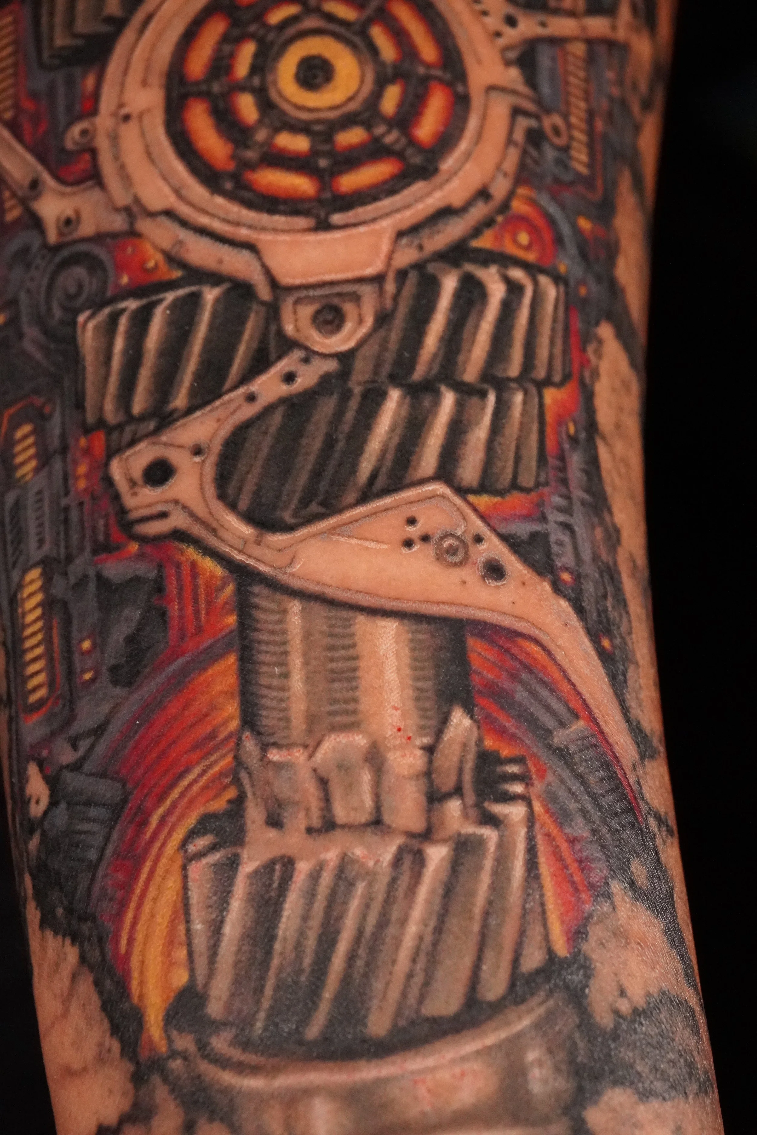 robot arm tattoo Trinidad