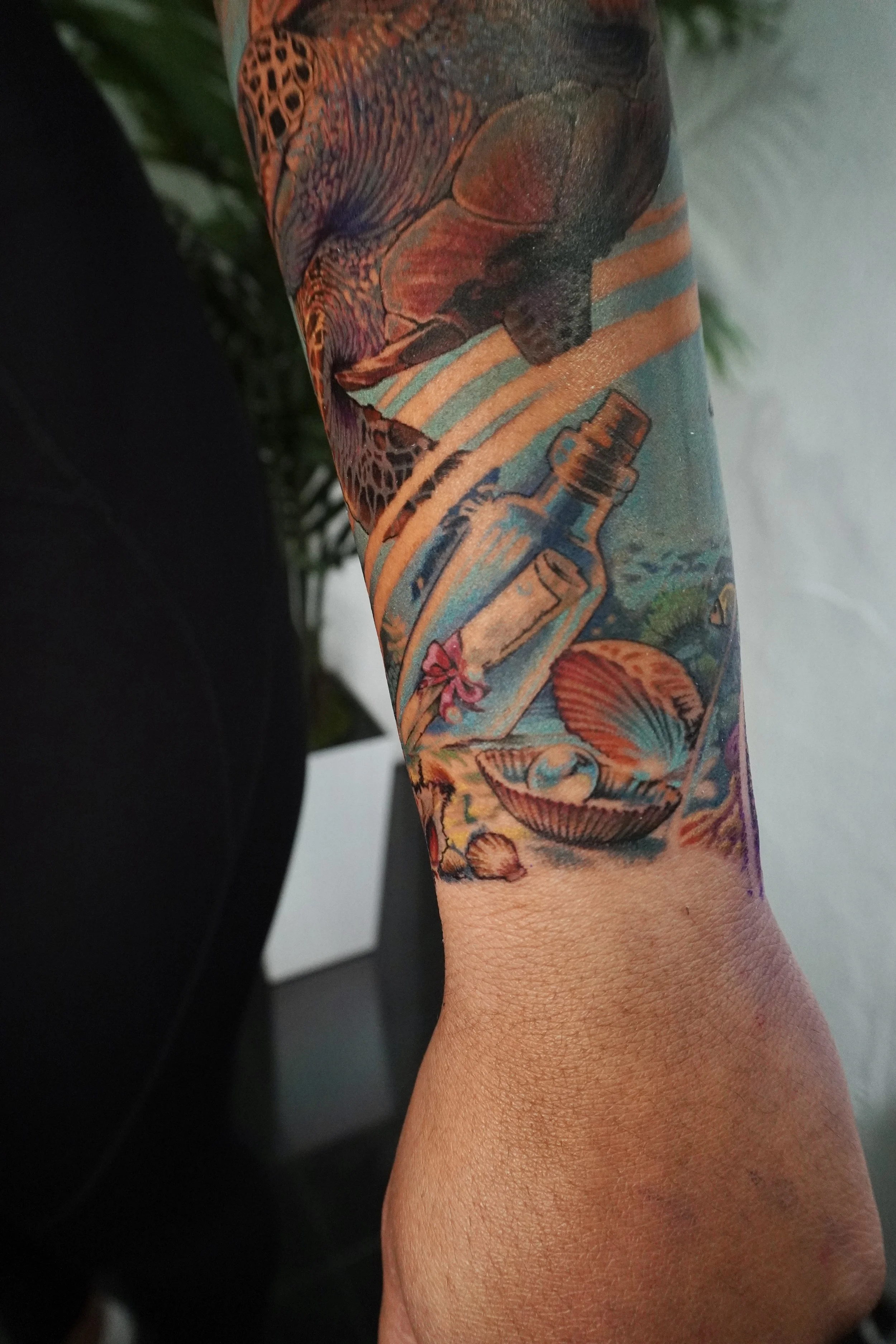 treasure tattoo clam with peal tattoo