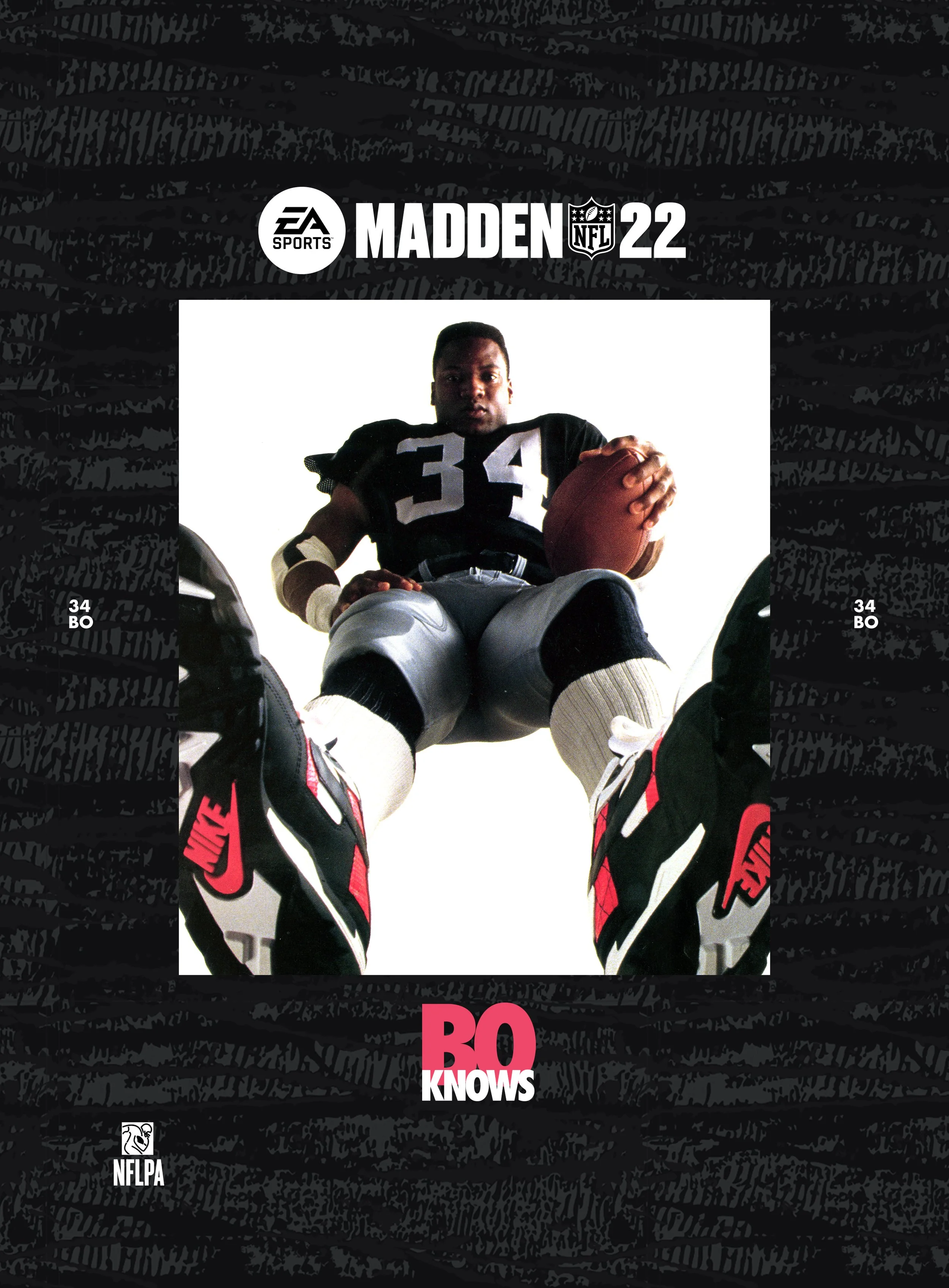Cover art for Madden NFL 22 featuring a football player sitting on the ground holding a football, wearing a black jersey with the number 34, black and red Nike shoes, and white football pants, with a white background and black textured border.