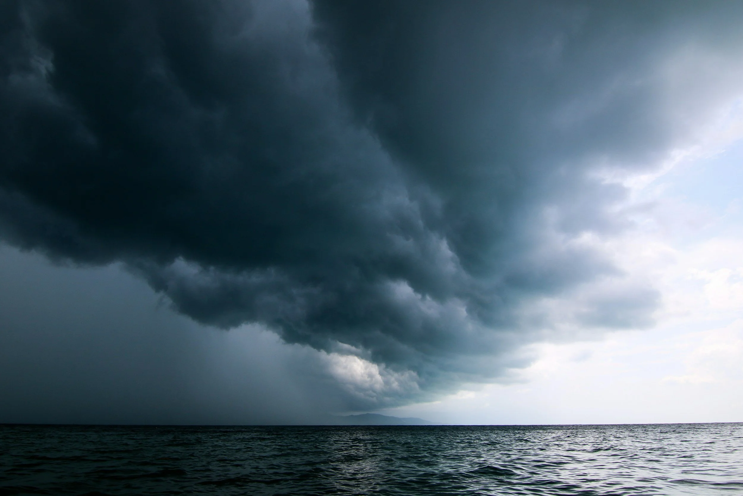 Dark clouds over ocean