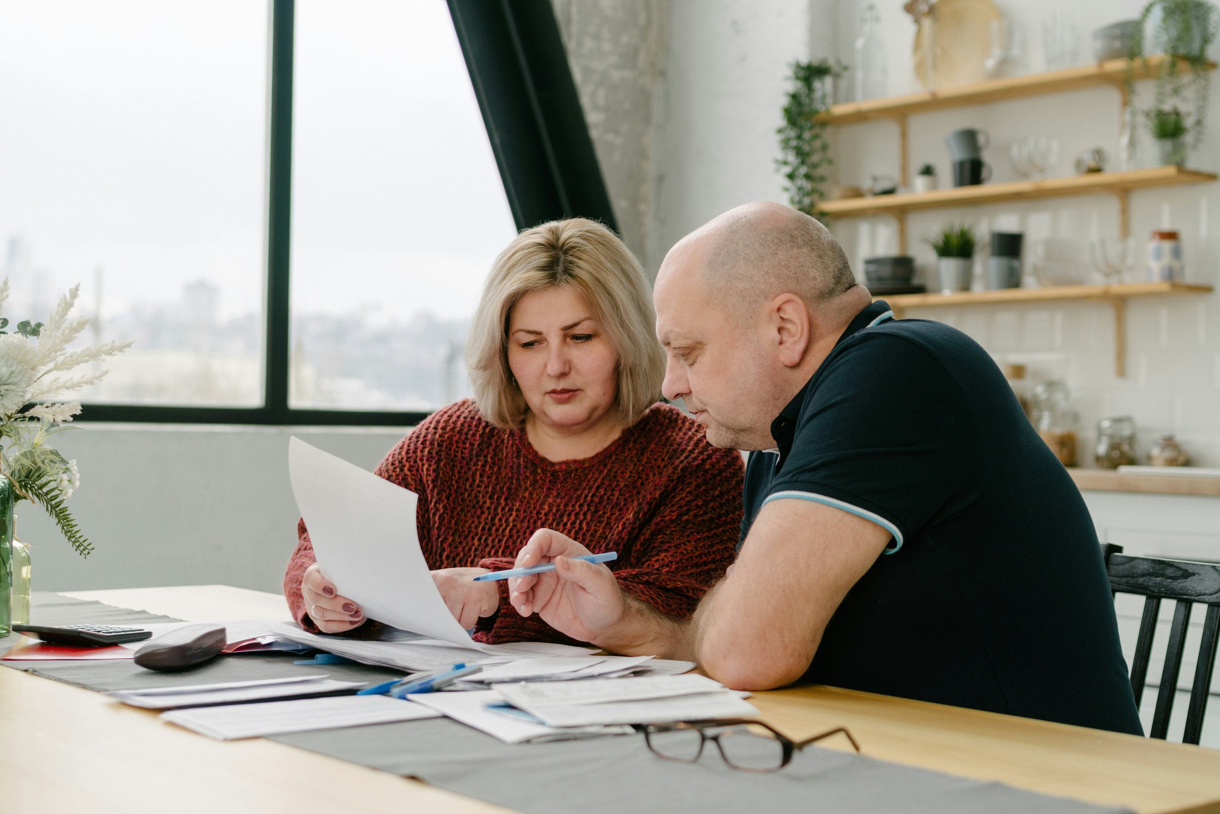 Home buyer reviewing closing costs and property taxes for Sammamish Washington home purchase