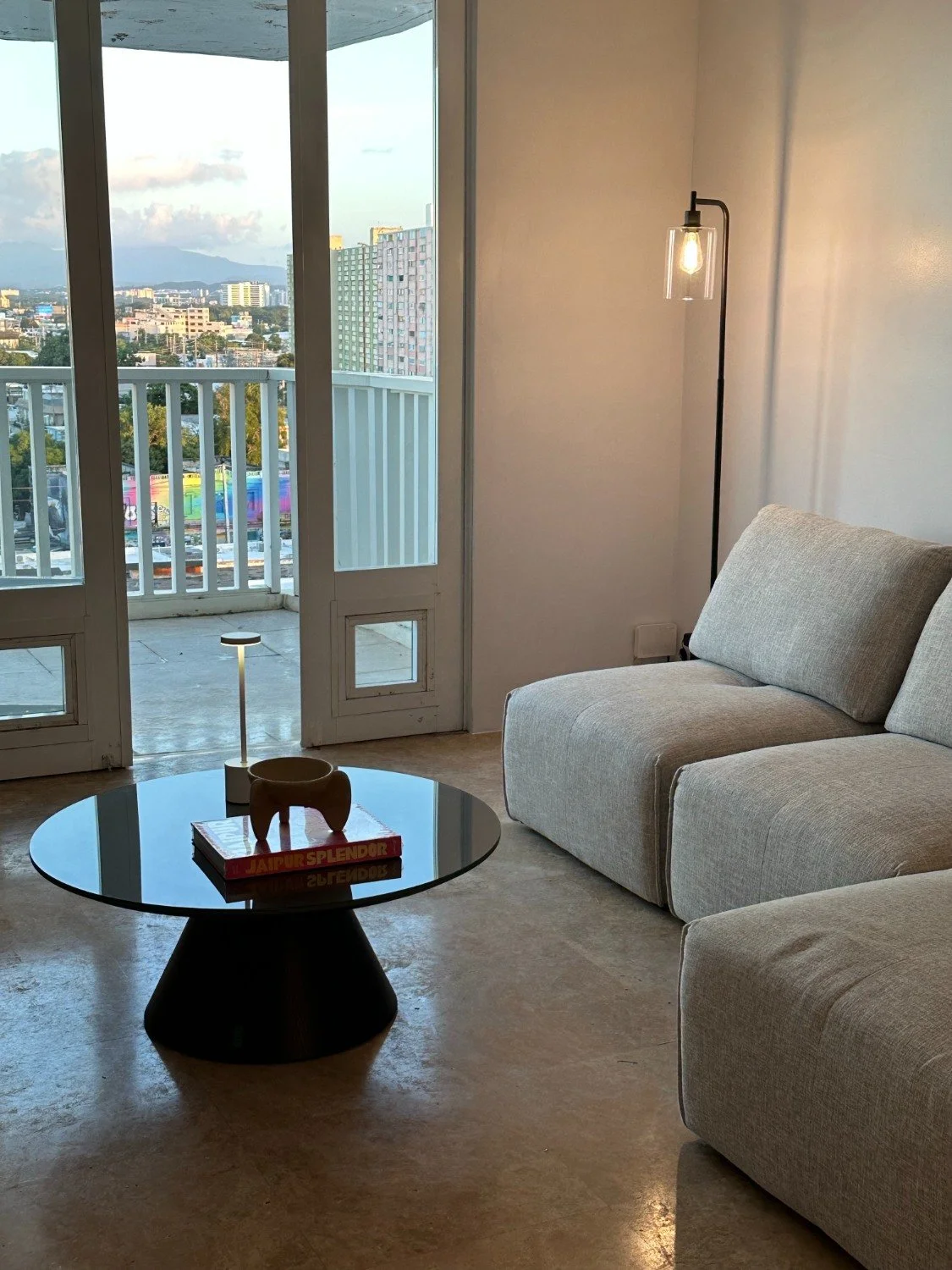 Staged living room with city views in an Eastside Seattle home