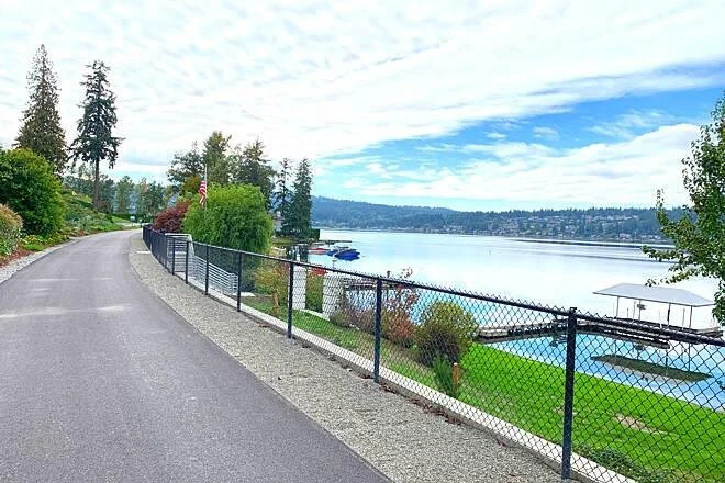 East Lake Sammamish Trail along Inglewood Hill neighborhood Sammamish Washington with lake views and residential homes