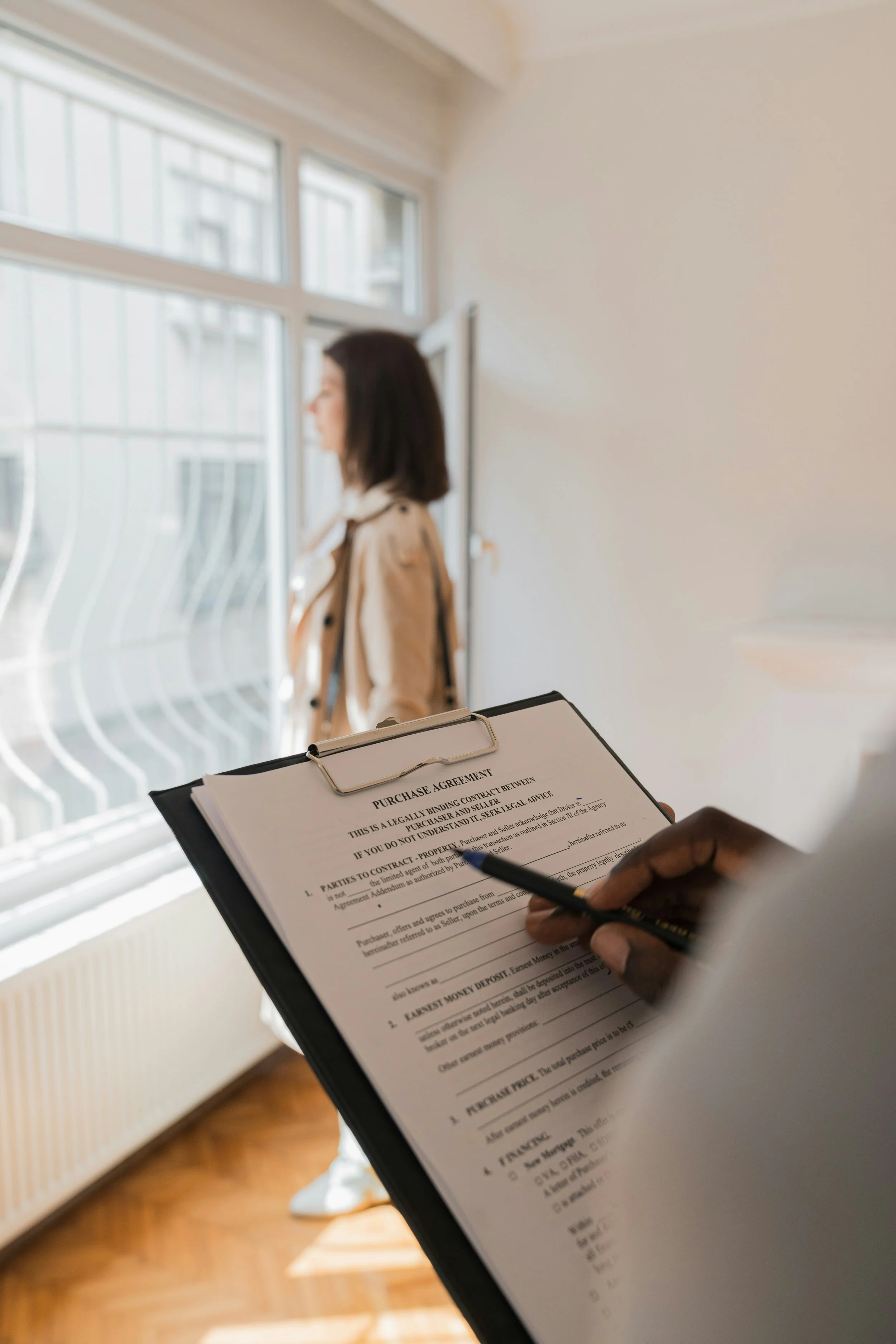 Real estate agent walking through a Sammamish home before listing to assess preparation needs