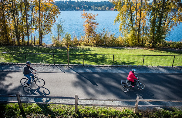 "Family walking on a trail in a Sammamish, WA community"