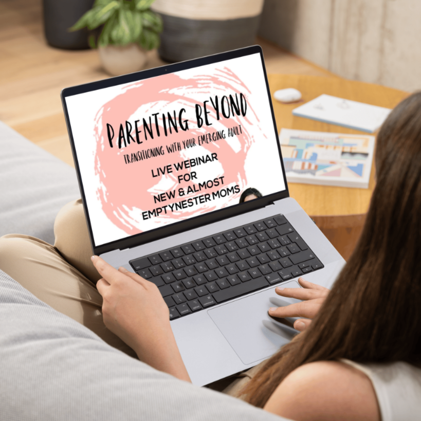 Laptop screen displays an announcement for a live webinar on parenting beyond transitioning with an emerging adult, specifically for new and almost empty-nester moms.