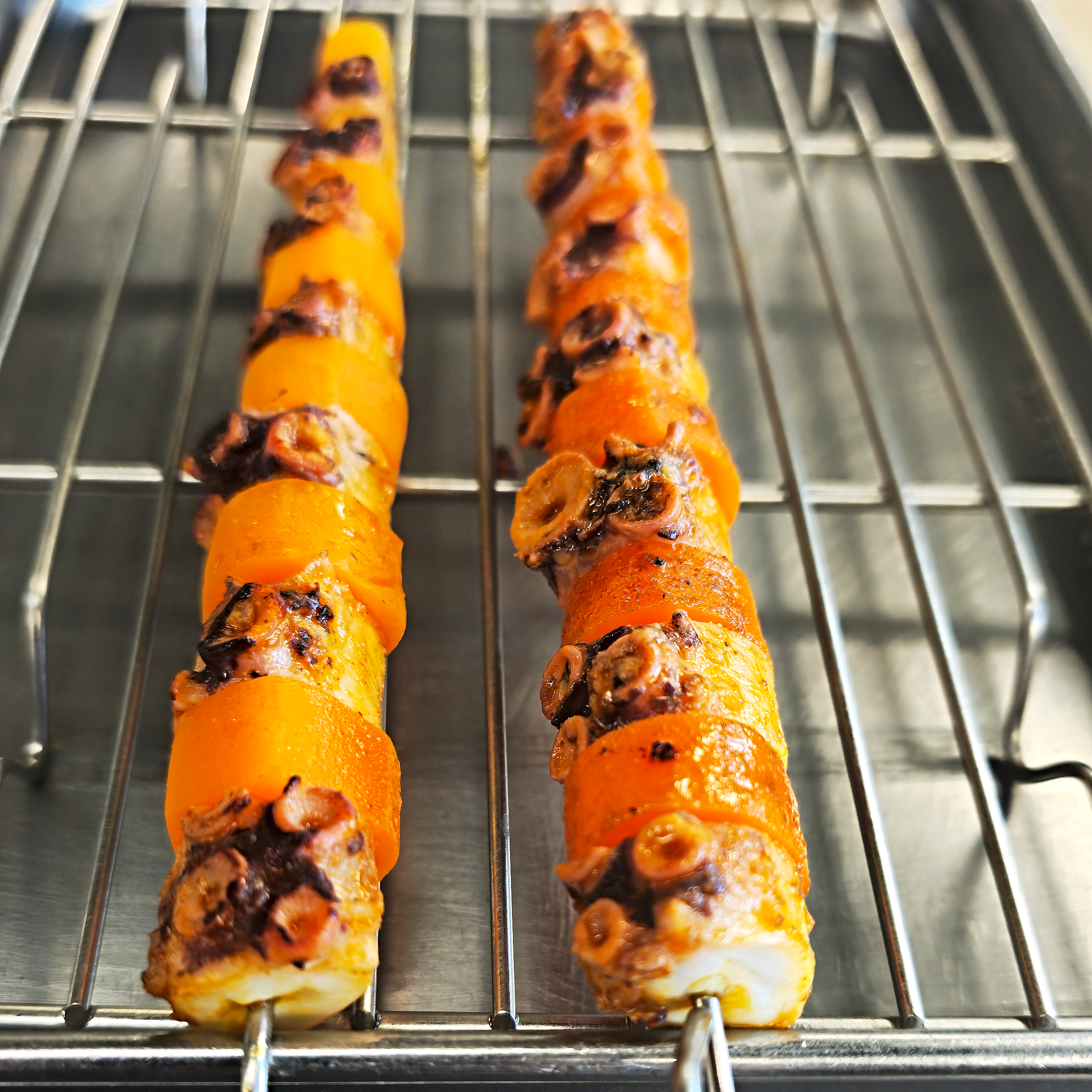 Skewers of octopus and carrot.