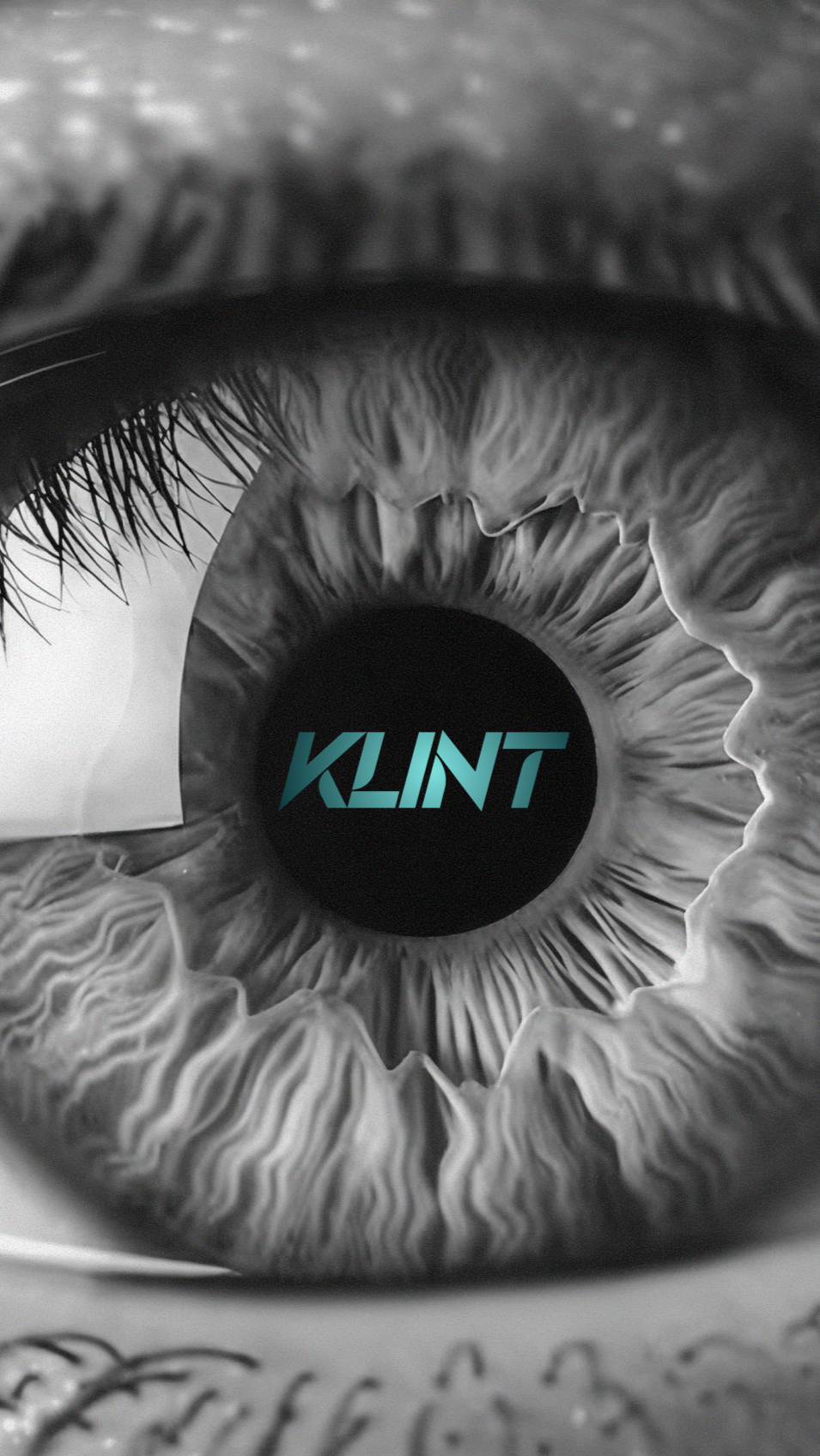 Close-up of a human eye with the word 'KLINT' in the center of the iris