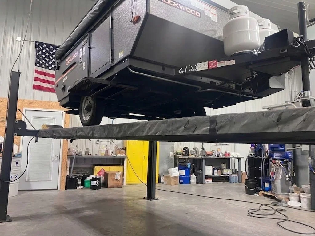 Protective undercoating applied to a camper by Grenade Offroad in Columbus, IN