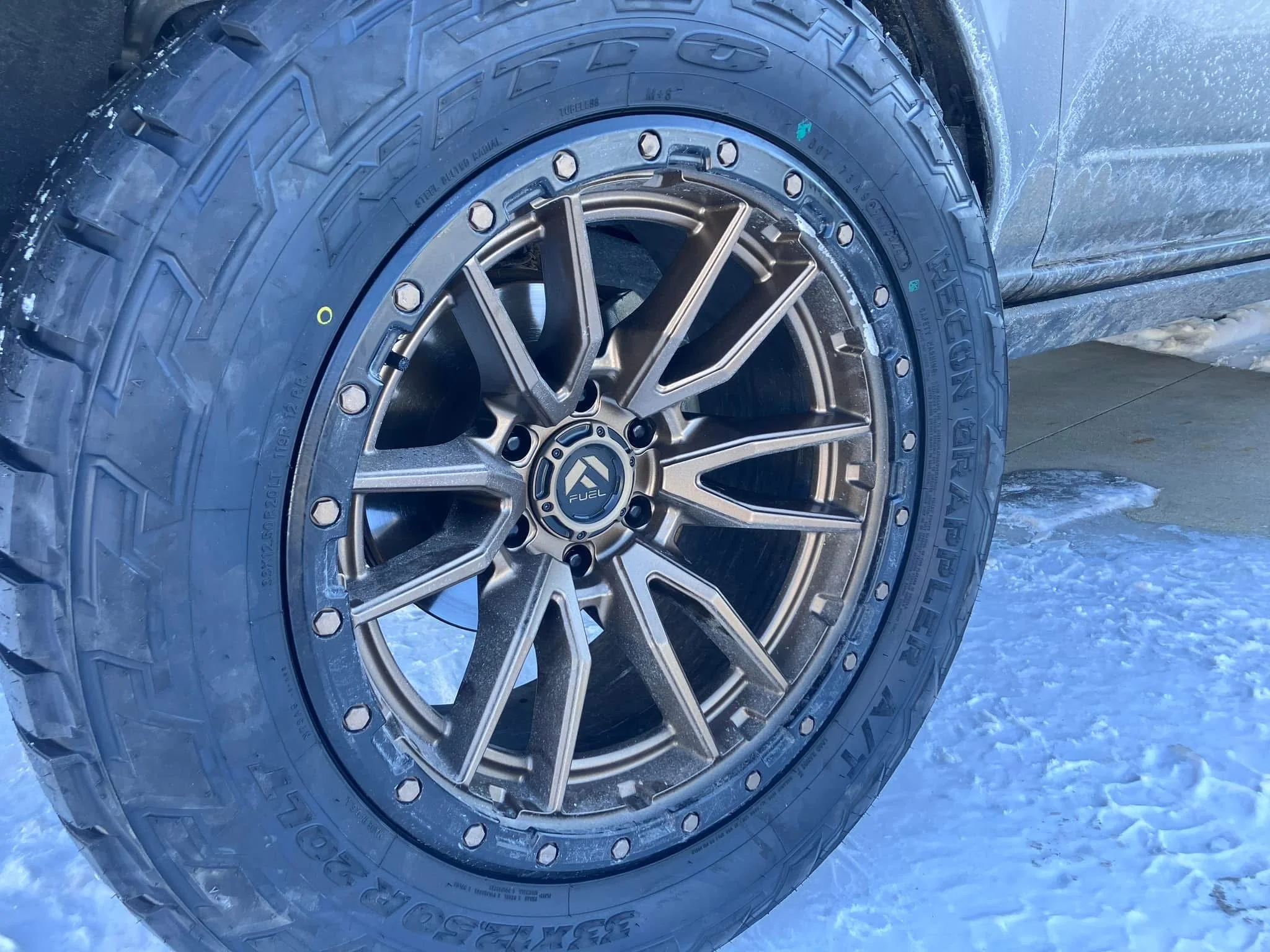 Off-road wheels and tires on a truck in Columbus, IN