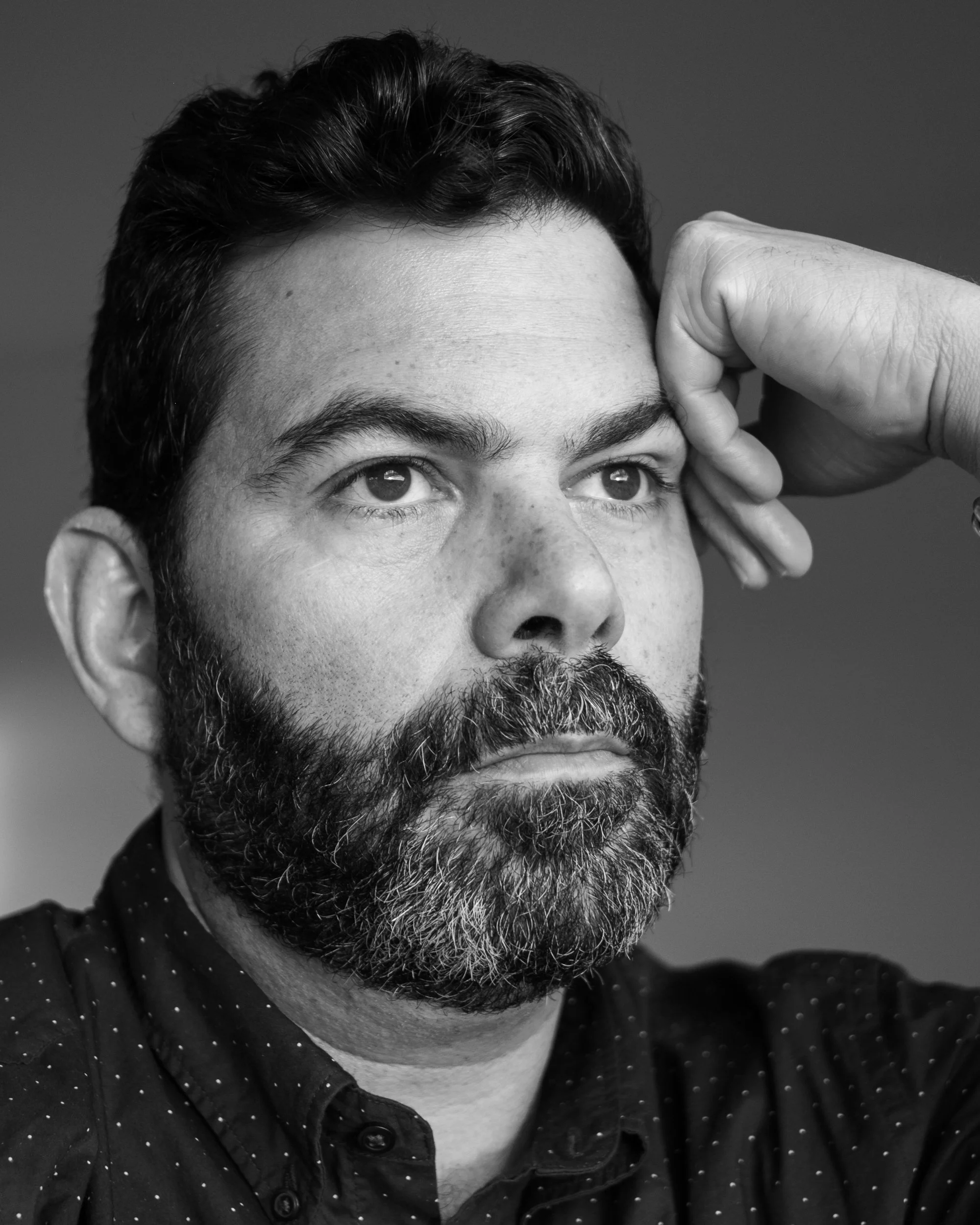 Black-and-white portrait of Seattle photographer Ricardo Gotla