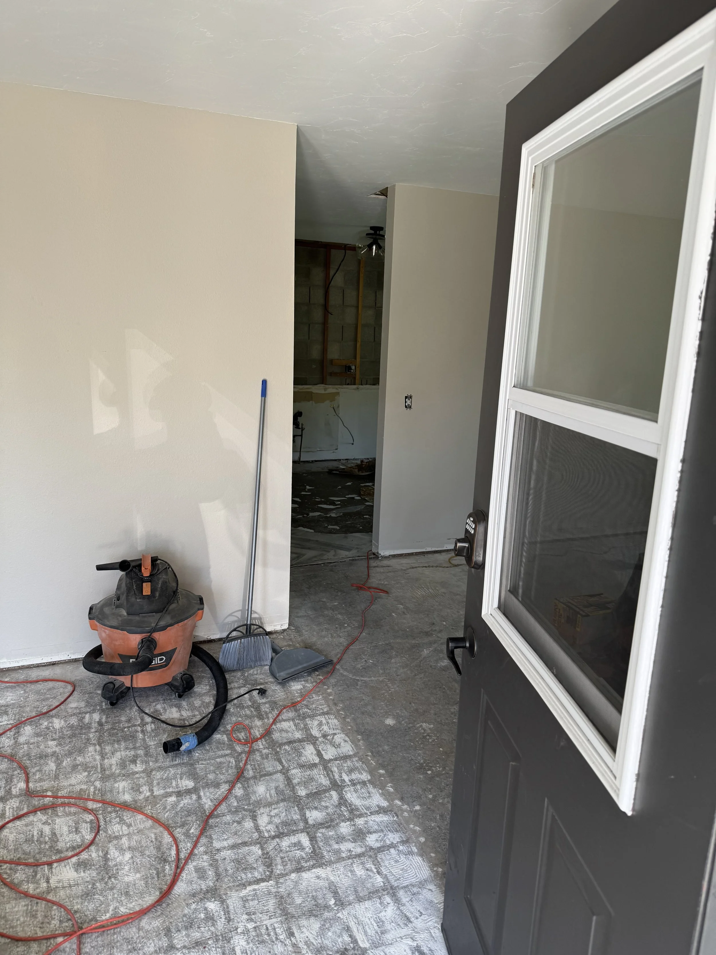 Picture taken from entry door into kitchen. To the left is the hallway to the guest and master  bedroom.