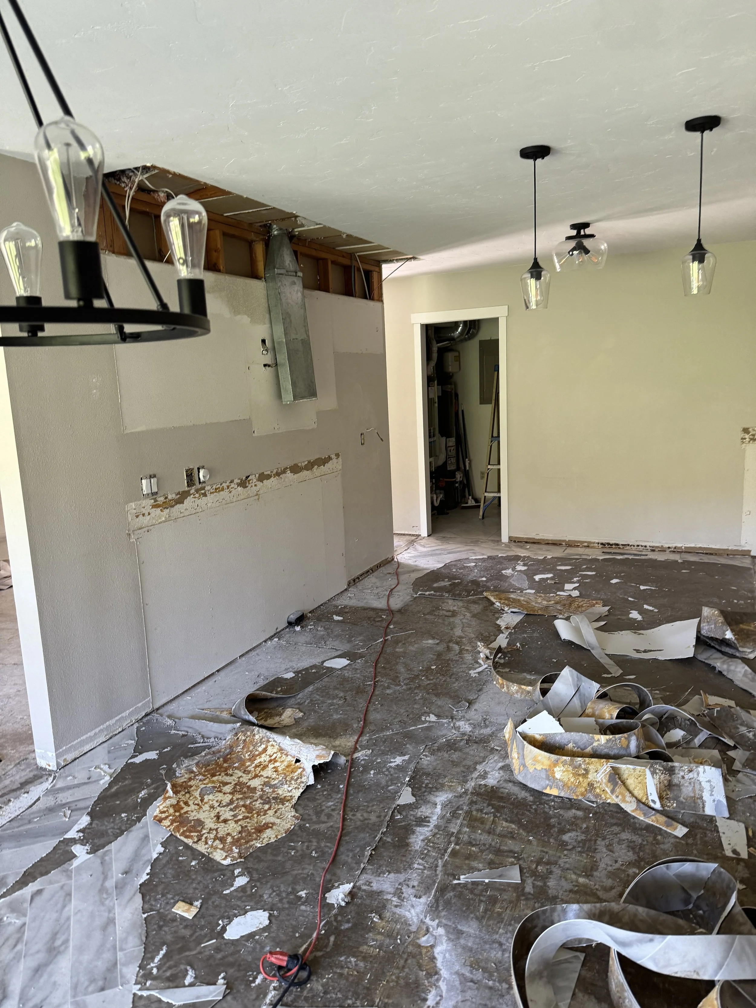 Kitchen divider wall and utility room door from dining area. 