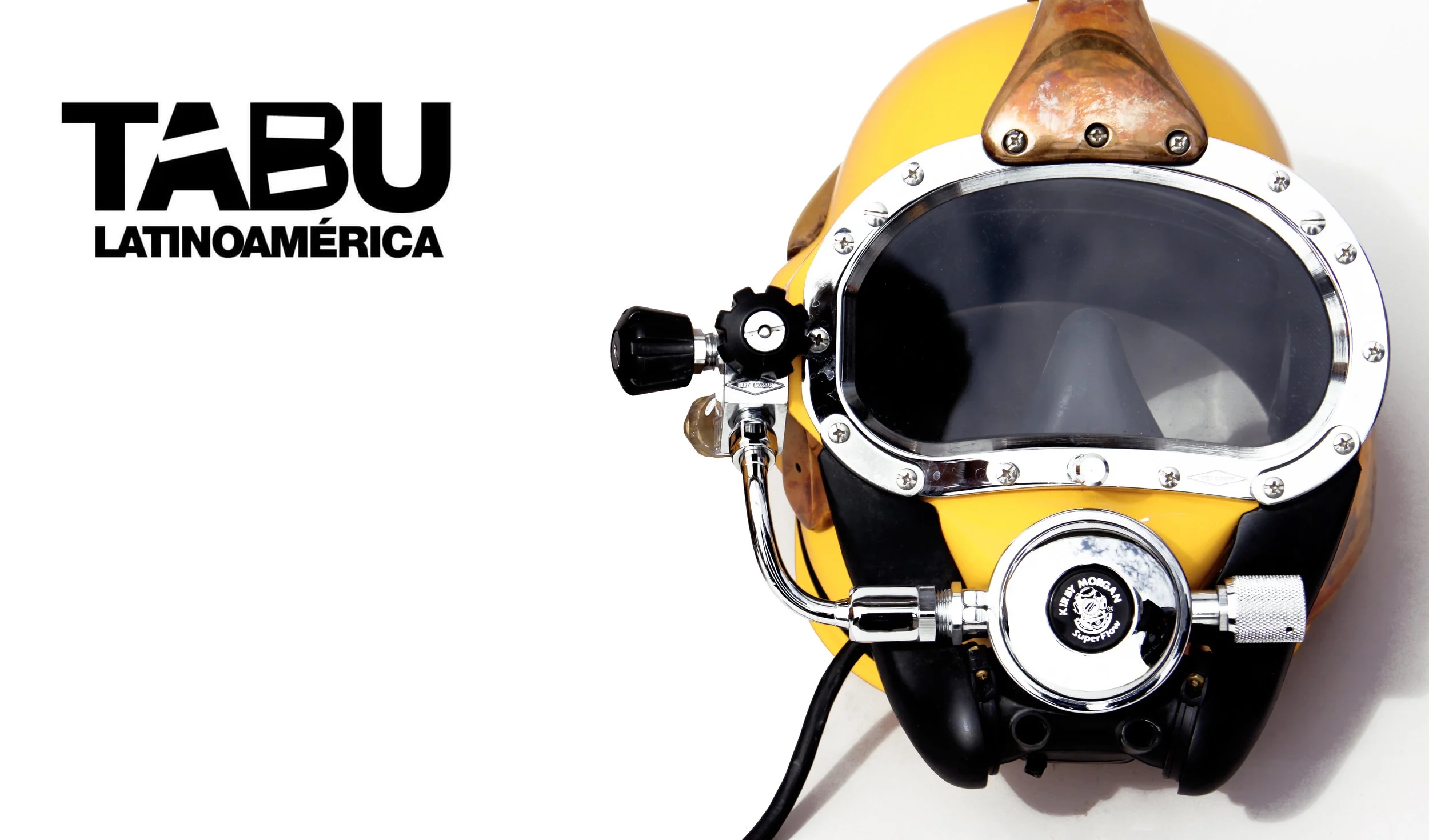 A yellow scuba diving helmet with a clear face shield and attached hoses, set against a plain background.