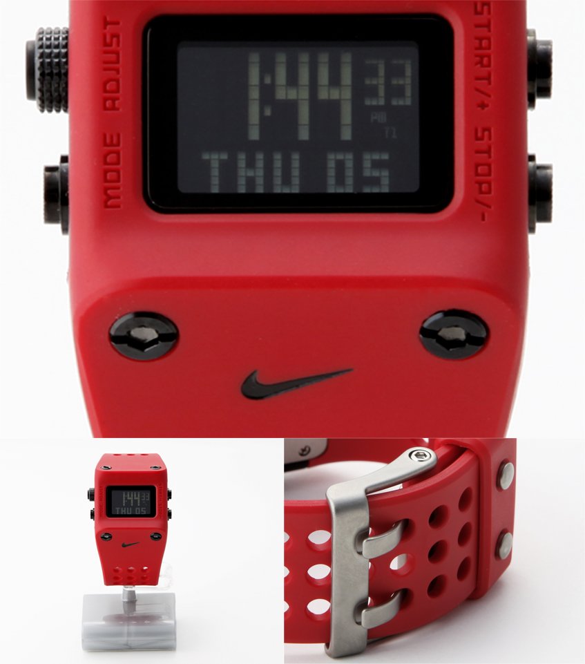 Close-up of a red Nike digital sports watch with black buttons and a perforated strap, displaying the time 1:44:33 PM on December 5th, Thursday. The watch has a black Nike swoosh logo on the front and is mounted on a stand, with additional images sho