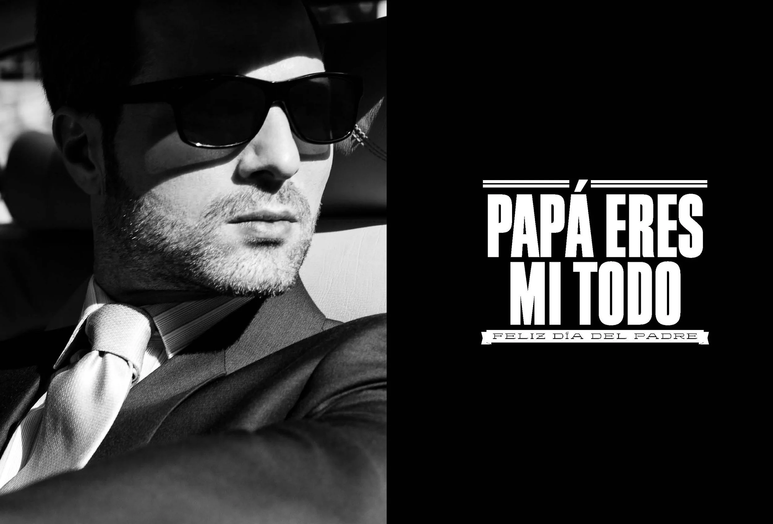 Black and white photo of a man wearing sunglasses, a suit, and a tie, with a message in Spanish wishing a happy Father's Day.