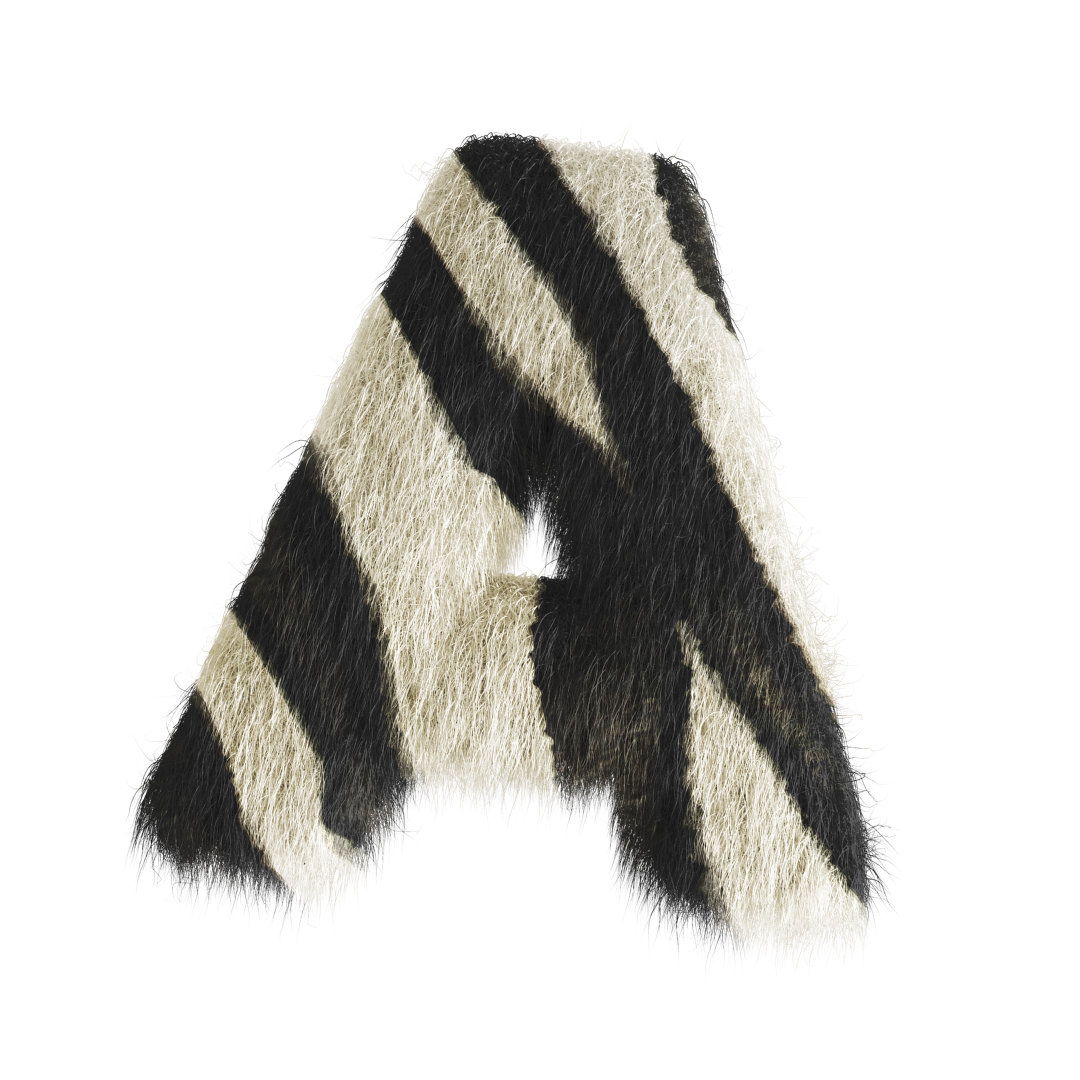 A faux fur letter with black and white diagonal stripes.