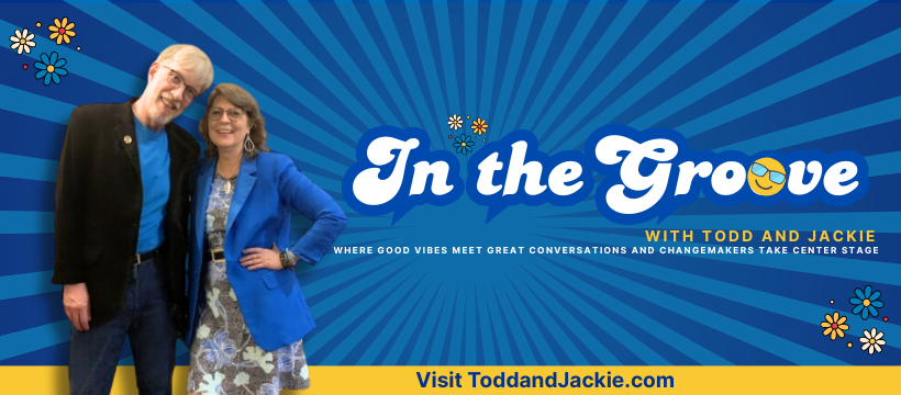 Two people, Todd and Jackie, standing together and smiling at the camera against a vibrant blue background with radial lines and small flower illustrations, promoting the 'In the Groove' podcast.
