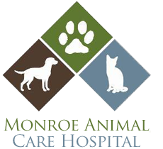 Logo for Monroe Animal Care Hospital featuring silhouettes of a dog, a cat, and a paw print in diamond shapes.
