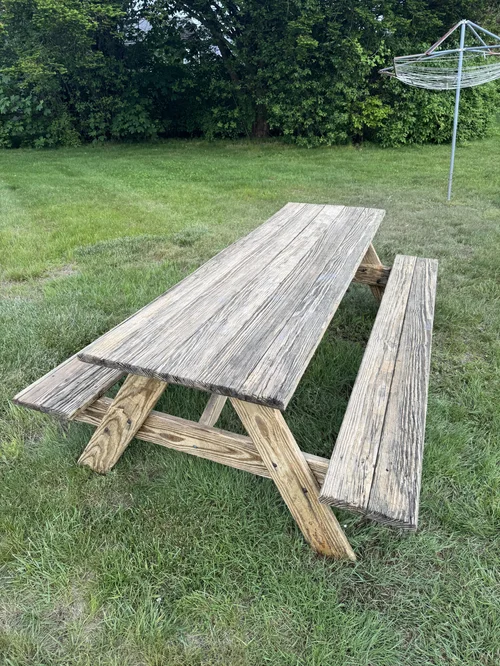 After: picnic table cleaned up on the lawn