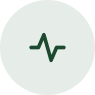Green heartbeat line icon inside a light gray circle