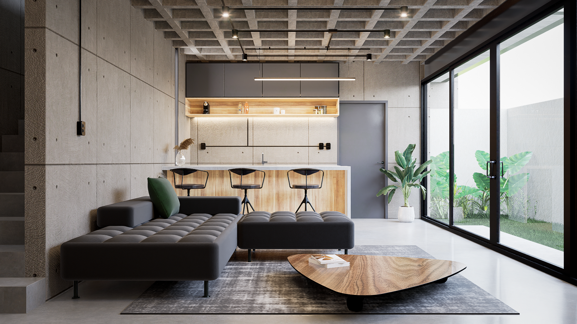 El sótano, cuyo uso es recreativo, integra una cocina y una sala tipo lounge que se integra con el espacio de jardín a traves de grandes ventanales, permitiendo que la luz natural inunde el concreto y lo dote de calidez.