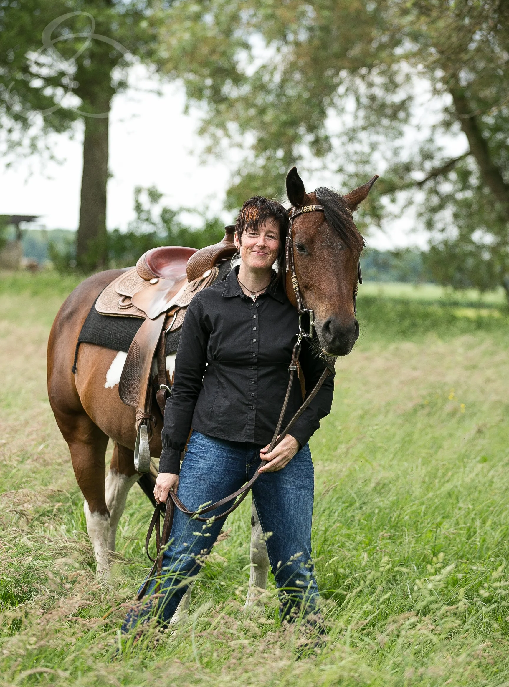 Britta and her American Paint Horse Sunny in Germany